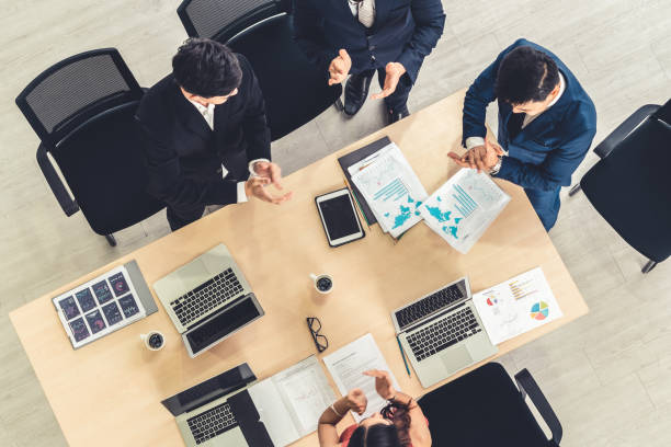 istock Successful business people celebrate together with joy 1264904506
