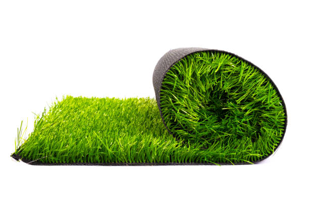 istock artificial turf roll of green grass isolated on white background 1264915210
