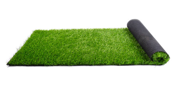 istock roll of artificial green grass isolated on white background, lawn 1264915218