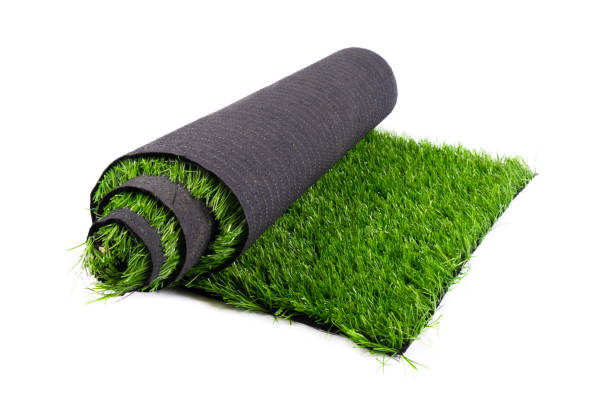 istock roll of artificial green grass isolated on white background, lawn 1264915221