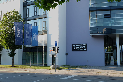 Munich, Germany / Bavaria - August 9, 2020: IBM International Business Machines Corporation American personal computer PC an artificial intelligence company building with logo in Munich Germany.