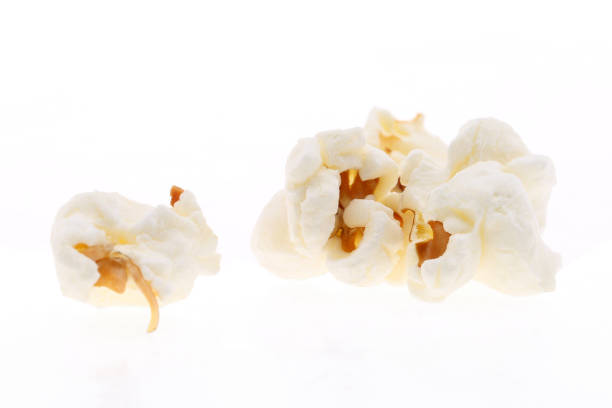 istock Heap of salted popcorn, isolated on white background 1264922173