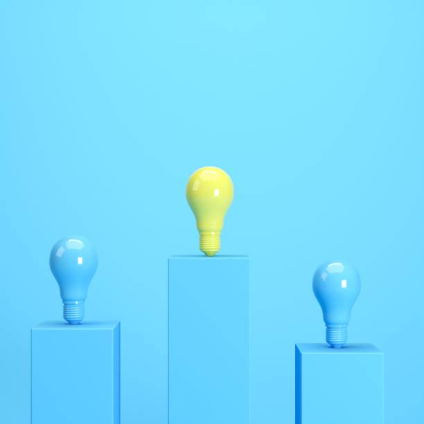 istock Yellow Light bulb standing among blue light bulbs on blue background. 3D Render Minimal idea concept. 1264928628