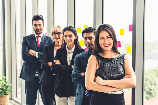 istock Successful business people standing together 1264928722