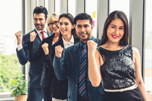 istock Successful business people standing together 1264933683