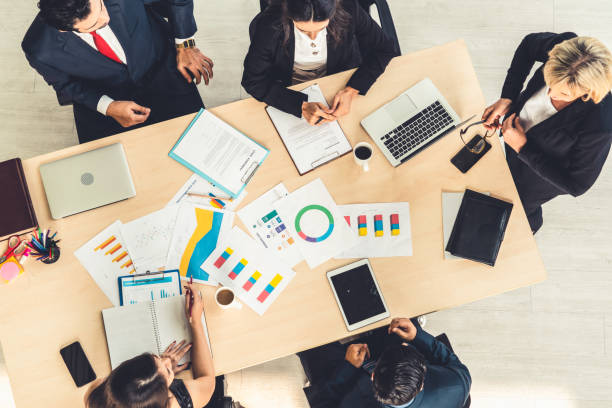 istock Business people group meeting shot from top view 1264934365