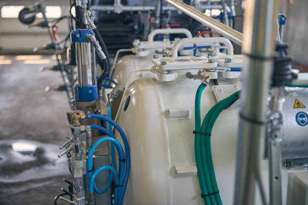 istock Big white barrels standing in one line 1264935117