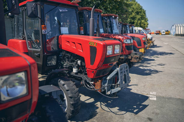 istock Focused photo on tractors standing in line 1264935311
