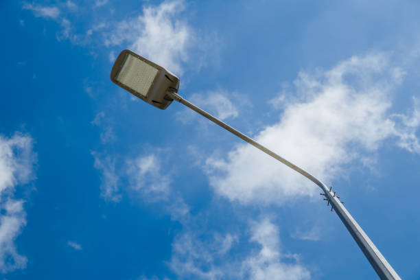 istock Street lantern on sky background.A modern street LED lighting pole 1264941679