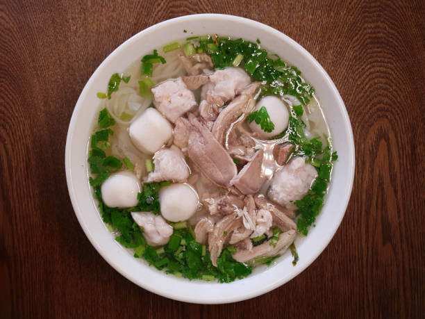 istock Flat Rice Noodle Soup With Fish Ball 1264943678