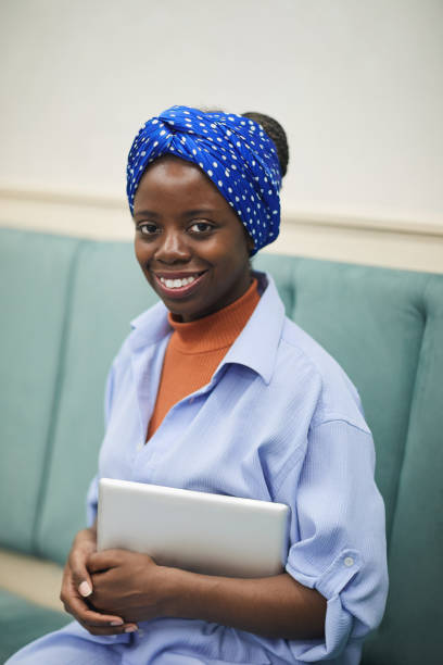 istock African woman with tablet pc 1264949756