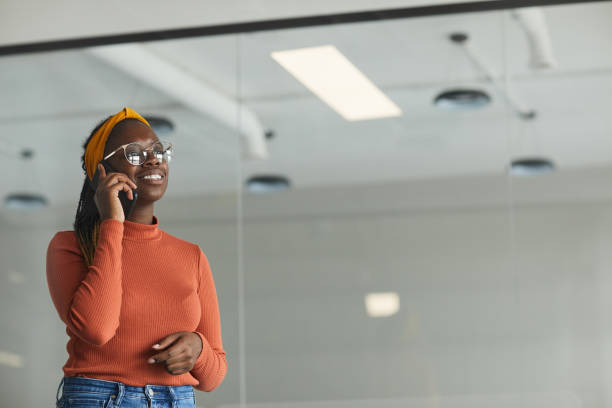 istock Woman talking on the phone 1264949771