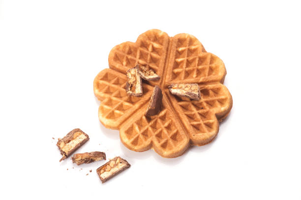 istock Freshly baked waffles with chocolate isolated on white background 1264952000