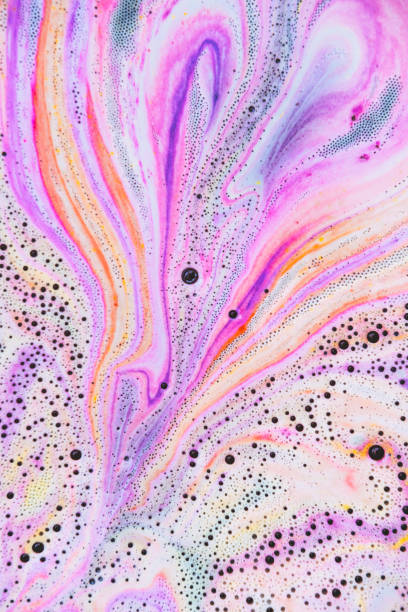 istock Colorful rainbow bath foam with bubbles in the water. Galaxy imagination. Marble texture effect. Beauty and luxury background. Abstract art, flat lay 1264952403