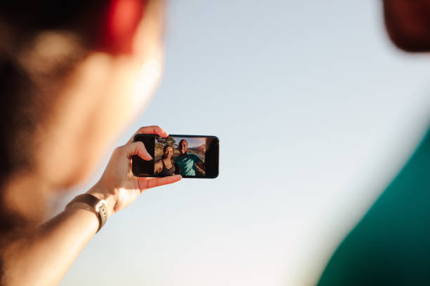 istock Athletic couple taking a selfie 1264957145