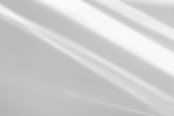 istock diagonal shadow and rays of light on a white background 1264962168