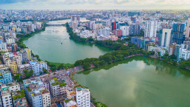 Aerial Photograph of Hatirjheel, Dhaka. Hatirjheel (meaning Elephant Lake) is a lakefront in Dhaka, Bangladesh that has been transformed into a transportation medium for minimizing traffic congestion.
The area was constructed under Bangladesh Army and the Special Works Organization. It is now a popular recreational spot for residents of Dhaka and is currently undergoing renovation. bangladesh photos stock pictures, royalty-free photos & images