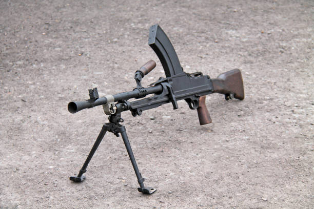 Army Machine Gun. A Vintage Military Wartime Army Machine Gun. tripod attack stock pictures, royalty-free photos & images
