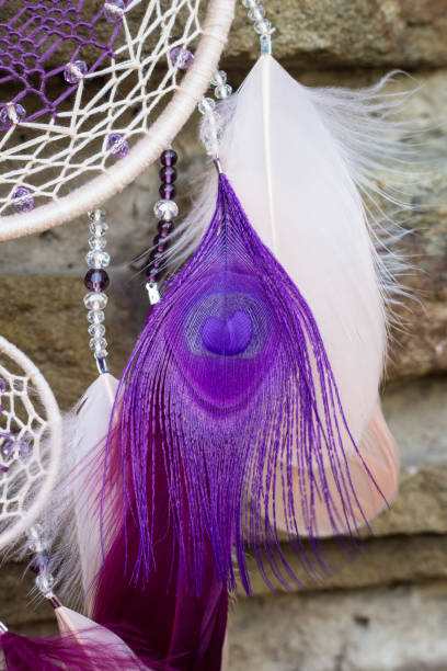 istock Handmade dream catcher with feathers threads and beads rope hanging 1264968712