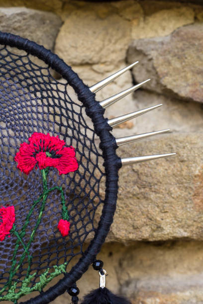 istock Handmade dream catcher with feathers threads and beads rope hanging 1264968716