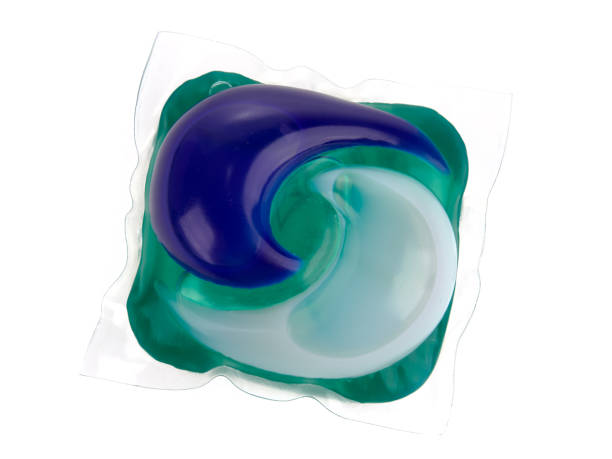 istock Close-up of a laundry detergent pod, isolated on white 1264968870