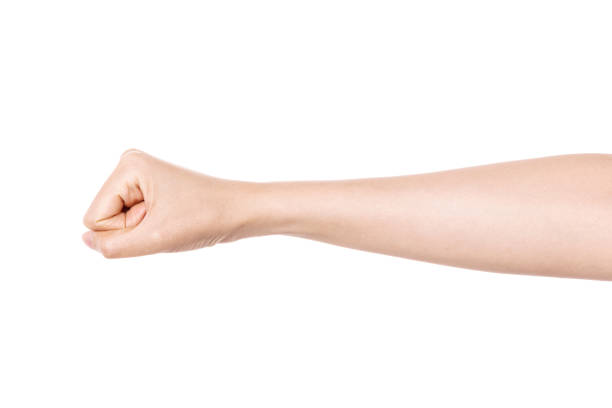 istock Woman hand gesture fist side isolated on white. 1264969148