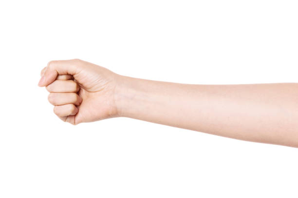 istock Woman hand gesture fist isolated on white. 1264969149
