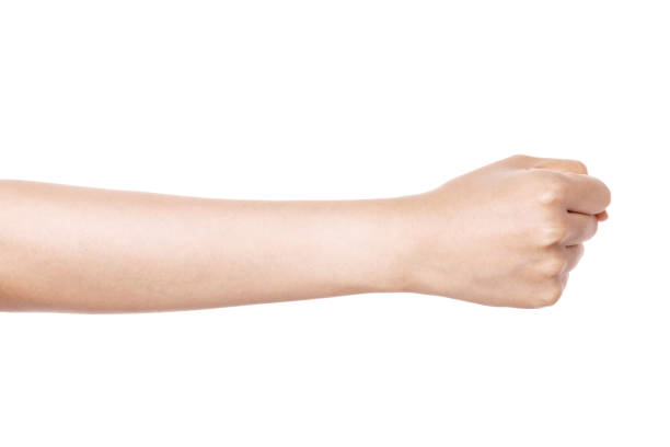 istock Woman hand gesture fist backside isolated on white. 1264969165