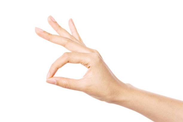 istock Woman hand gesture picking close up isolated on white. 1264969759