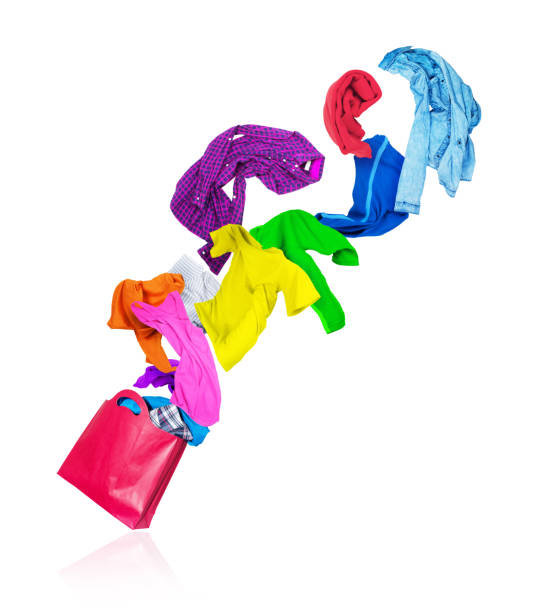 istock Bright colorful clothes fly out from packaging on a white background 1264972589