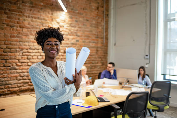 Young businesswoman standing in office.