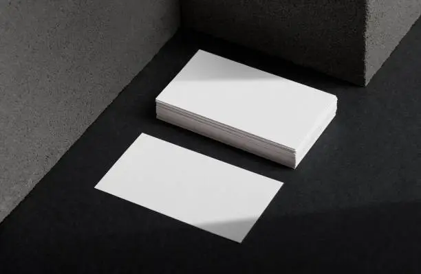Photo of Minimal business card mockup with concrete block