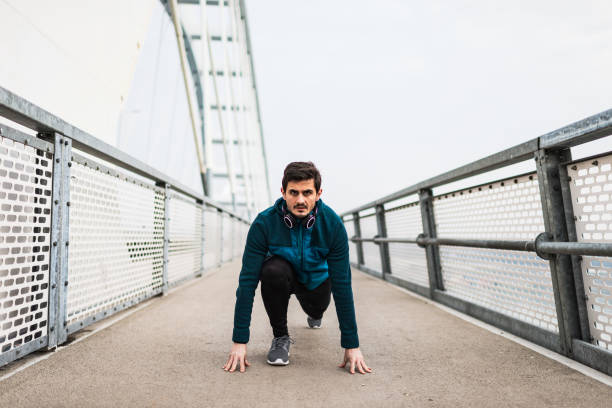 istock Fitness man exercising outdoors 1264976569