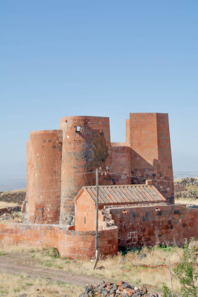 istock Medieval castle and church nearby 1264980560