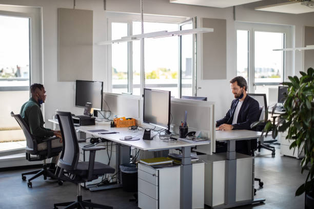 Business men working in office during pandemic