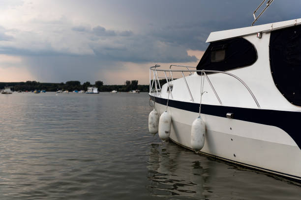 istock Luxury Yacht on the river at sunset 1264981383