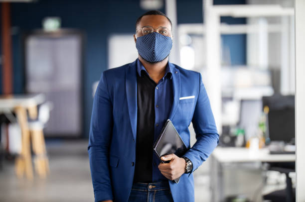 istock Male professional at work during corona virus pandemic 1264981508