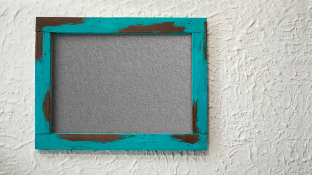 istock A grungy wooden frame with textured with concrete background and copy space 1264981941