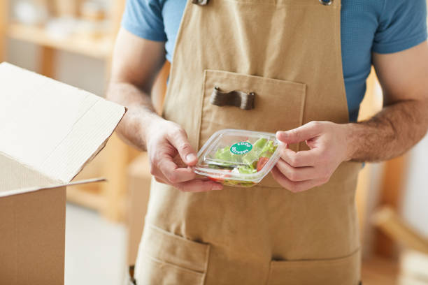 istock Worker at Food Delivery Service Close Up 1264983128