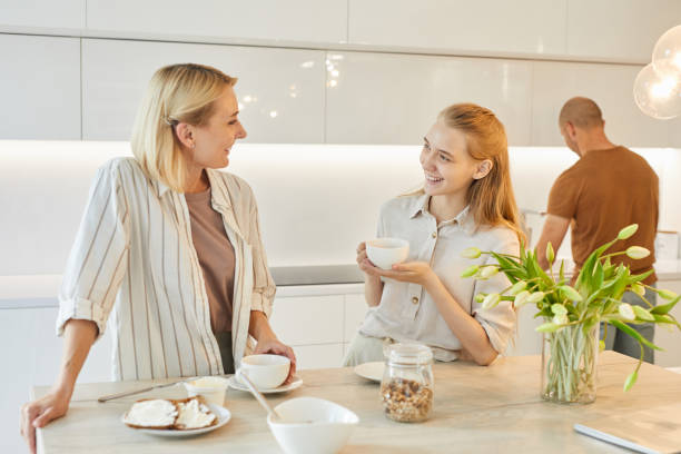 istock Modern Family in Kitchen Interior 1264986505