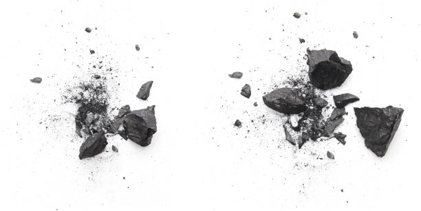 istock Pieces of broken black coal isolated on white background 1264991511