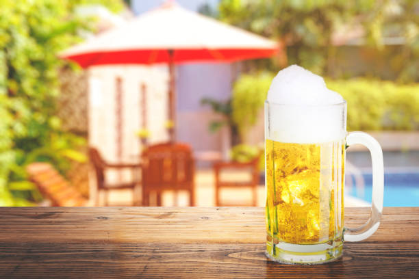 istock The glass of cold beer on the table 1264992210