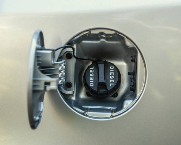 istock Diesel fuel cap of a grey car 1264993354