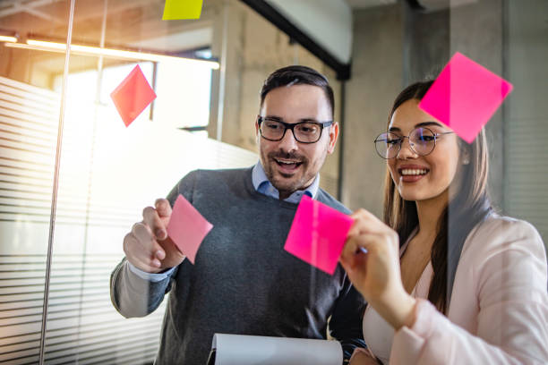 istock Business people meeting at office and use post it notes to share idea. 1264996282
