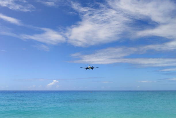 istock Landing plane at Maho Beach, Saint Martin 1264997287