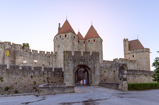 Carcassonne - France. July 5, 2020: One of the ancient entrances to the castle of medieval Carcassonne town