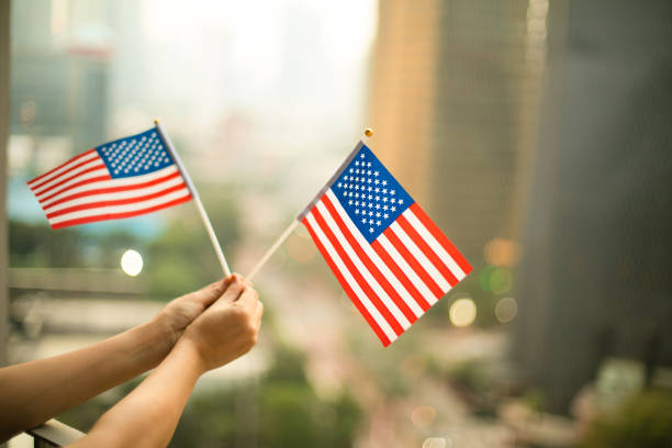 istock American Flag in the city scape 1264999419