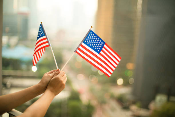 istock American Flag in the city scape 1265000066