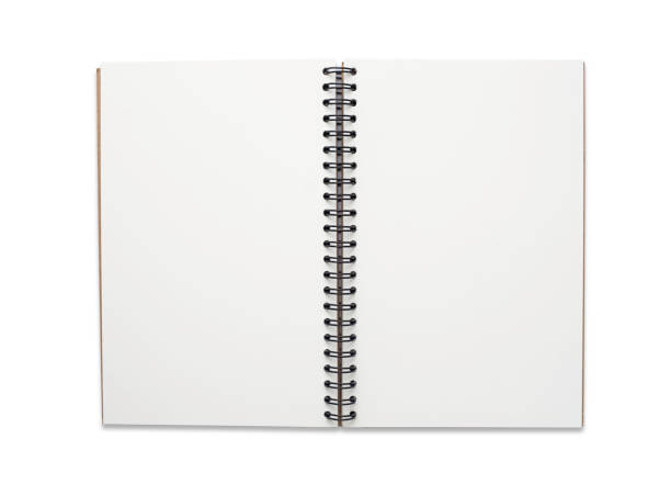 istock Top view above of open spiral blank page notebook isolated on white background for design a mockup. Education and business concept. flat lay 1265000413