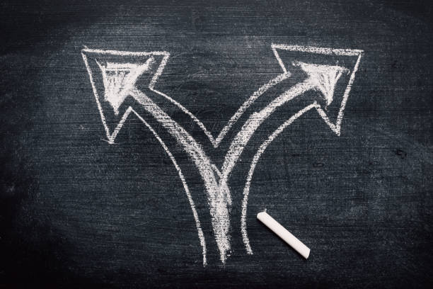 istock Two direction arrows as concept of choice and making decision 1265003226